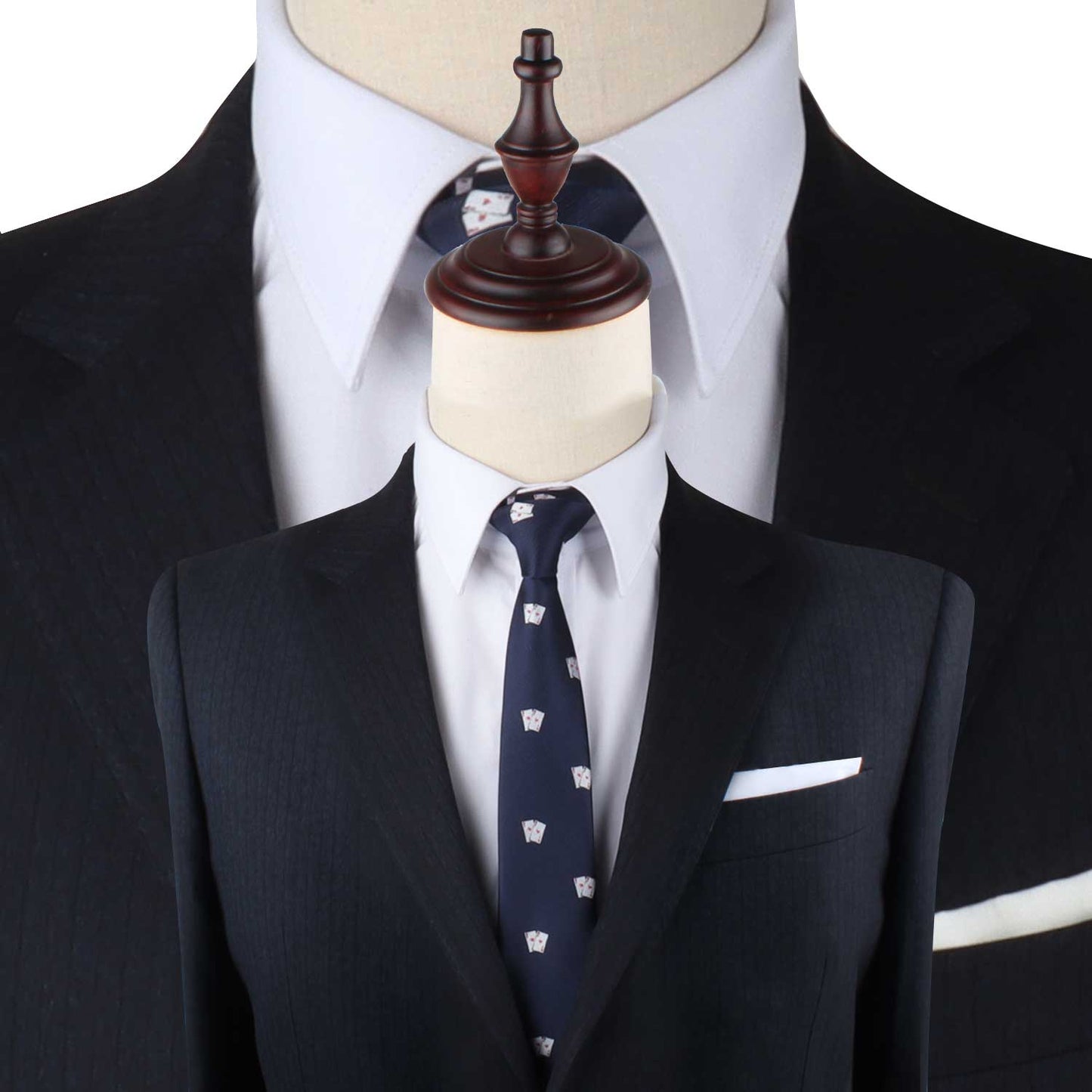 Mannequins dressed in formal attire: one in a white dress shirt and dark suit with a Poker Cards Slim Tie, and another focused closely on a white dress shirt collar with a dark suit. Elevate your style with these polished looks that make an impression.