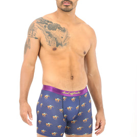 A person stands wearing Racing Horse Boxer with a snug fit, featuring a purple waistband and playful horse pattern that gallops across the white background.