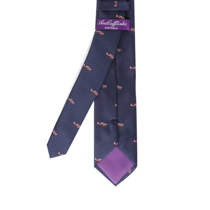 A Red Plane Tie with a purple and blue design on it.