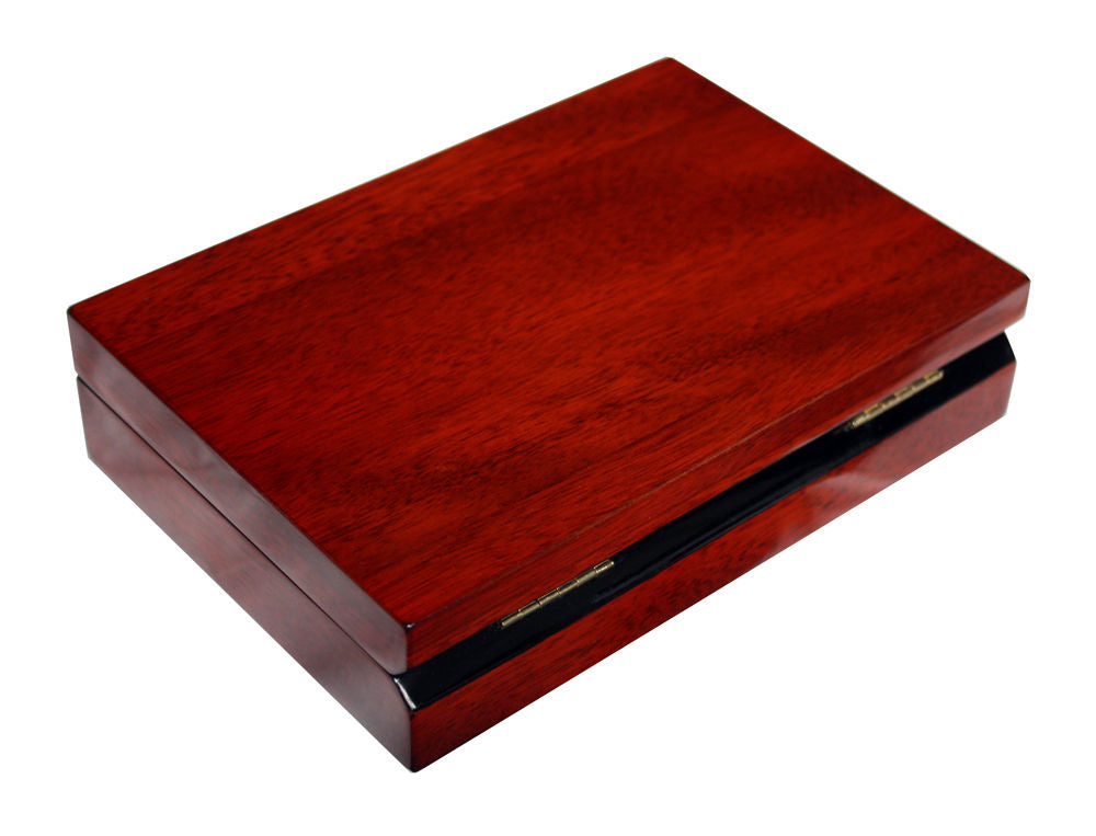 The Cherry Wood Cufflink Box is a closed rectangular case with a polished reddish-brown finish and visible metal hinge—an elegant, luxurious solution for displaying and storing your cufflinks.