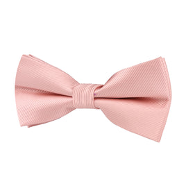 The Rose Gold Bow Tie adds a touch of elegance and charm to any formal look, beautifully standing out against a white, ribbed background.