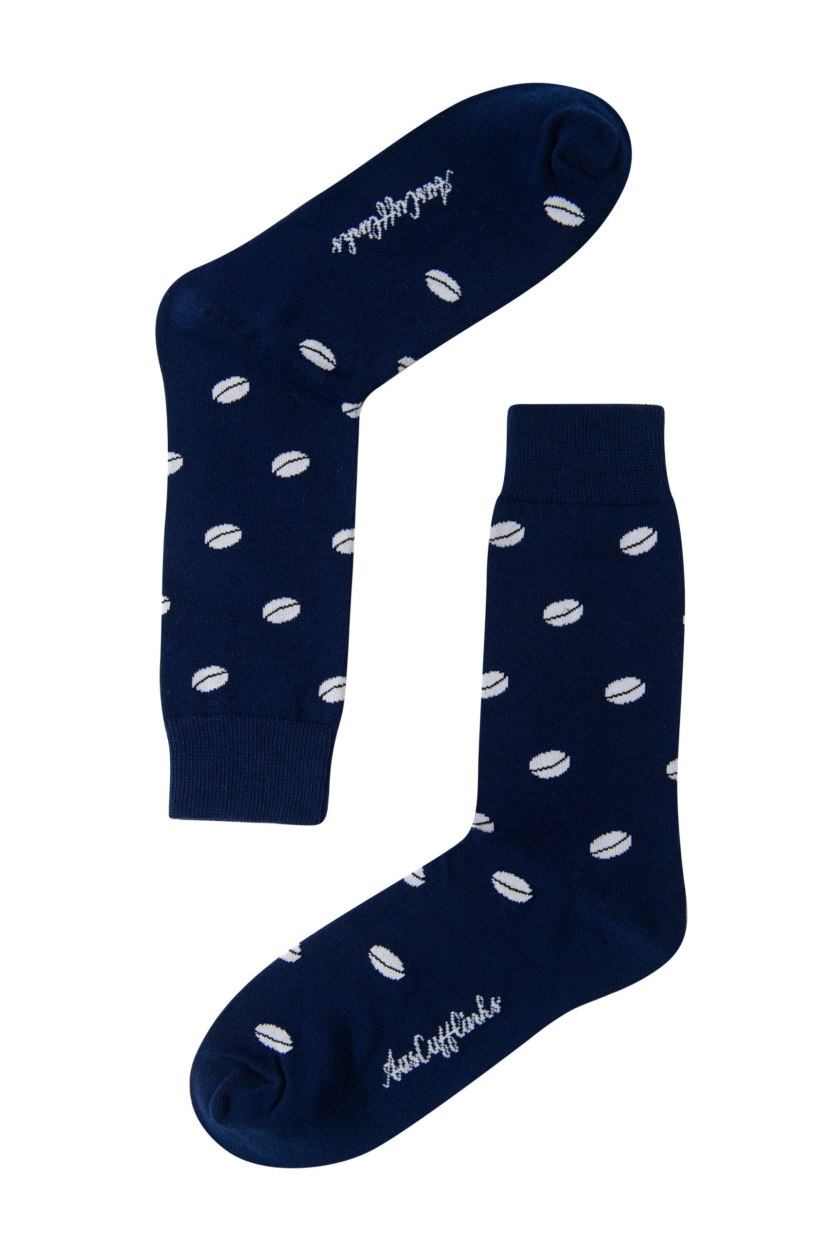 A pair of Rugby Socks with a white polka dot pattern and a sporty logo near the toe on an isolated white background.