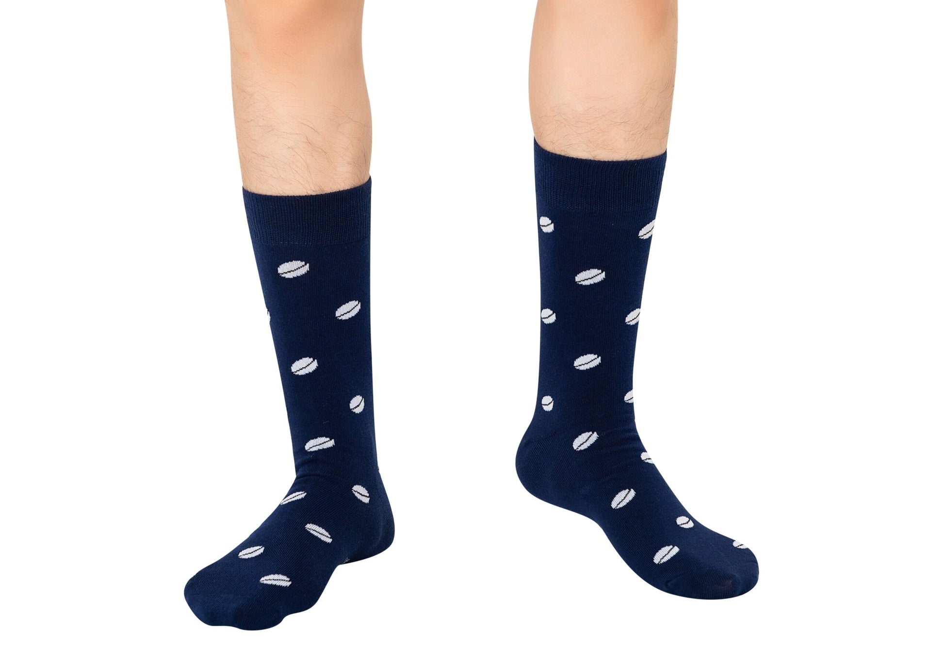A pair of legs sporting Rugby Socks with white polka dots, shown against a white background.