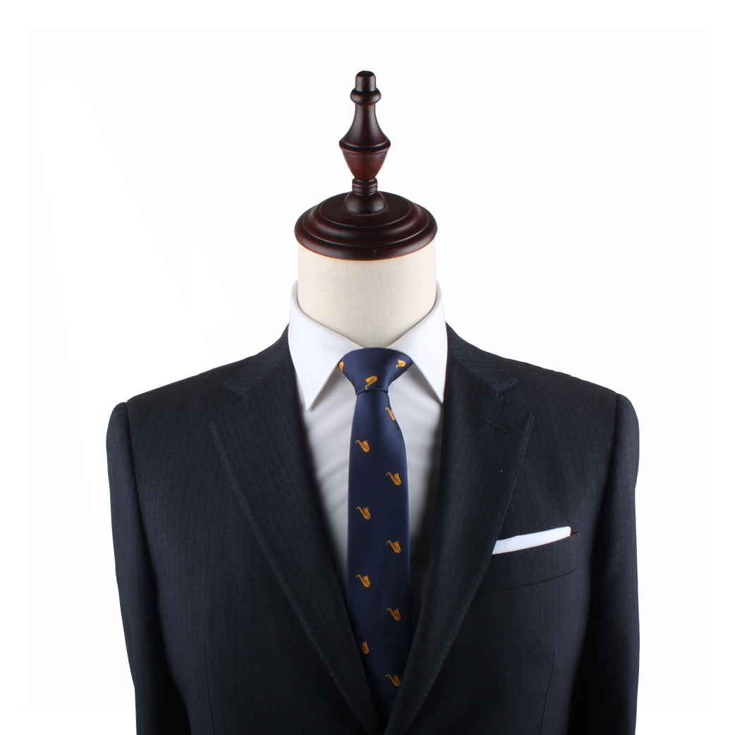 Navy blue suit jacket with a Saxophone Slim Tie on a mannequin torso.