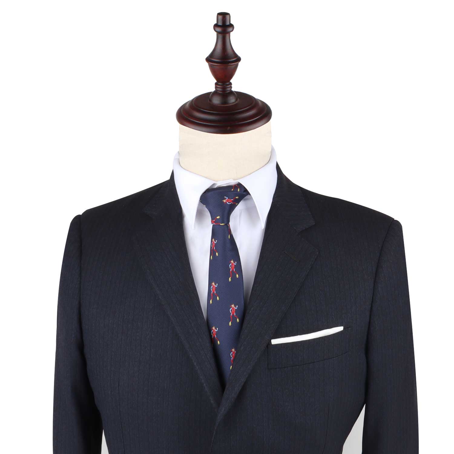 A stylish dark gray pinstripe suit on a wooden mannequin, featuring a white dress shirt, the Scuba Diver Slim Tie in blue, and a white pocket square that adds an element of intrigue.