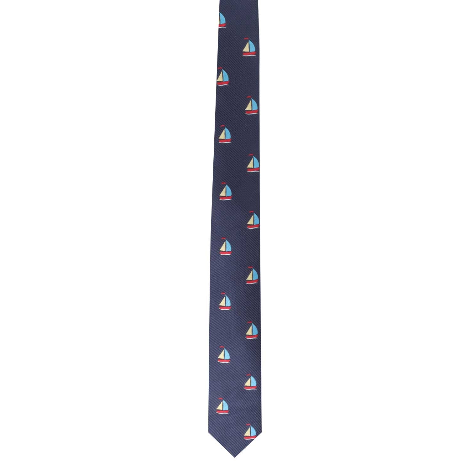 The Sea Lover Tie features a navy background adorned with small sailboat patterns in red, white, and blue that are evenly spaced along its length, making it the perfect accessory for anyone looking to embrace a nautical style.