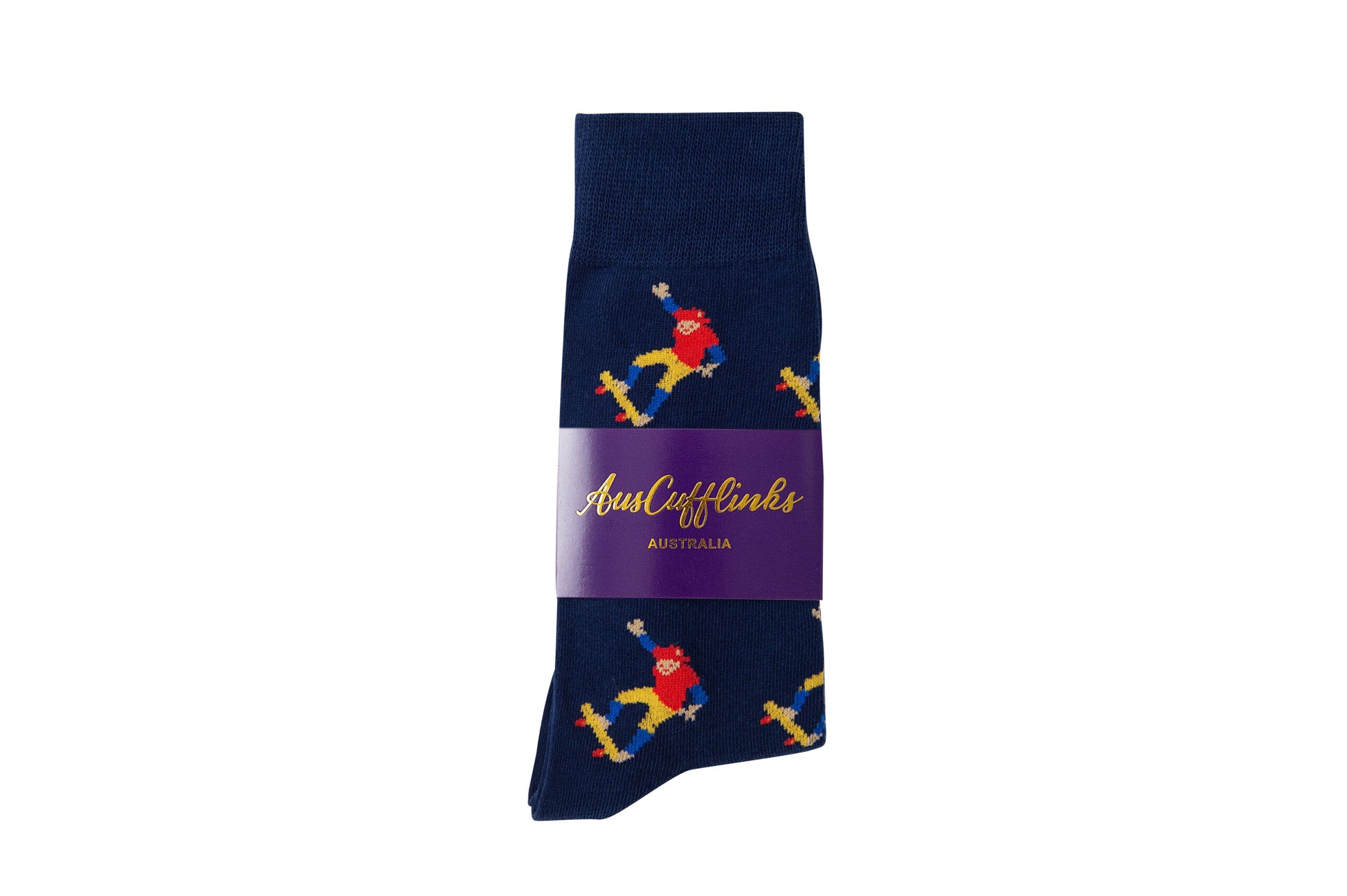 The Skateboarder Socks, featuring a striking pattern of skateboarders and wrapped in a chic purple AusCufflinks Australia label, offer street-smart comfort.