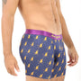 A man models Ski Underwear, featuring purple boxer briefs adorned with an orange skiing pattern and complemented by a purple waistband, designed for moisture-wicking performance, shown in a side pose.