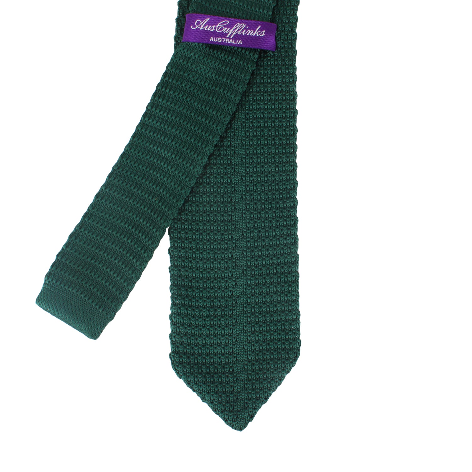A Slim Green Knit Tie with a purple label reading "AusCufflinks Australia" at the top, exudes elegance and sophistication through every thread.