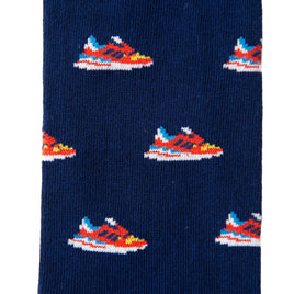 Elevate your stealthy fashion with Sneaker Socks in dark blue, featuring a whimsical design of vibrant sneakers in red, blue, and yellow.