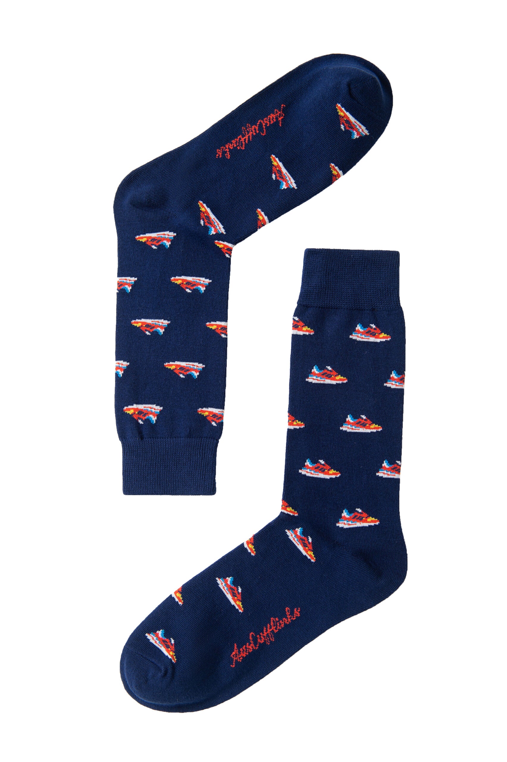 Sneaker Socks in navy blue feature red and white boat patterns with discreet red script writing near the toe, making them a stylish addition to any outfit.