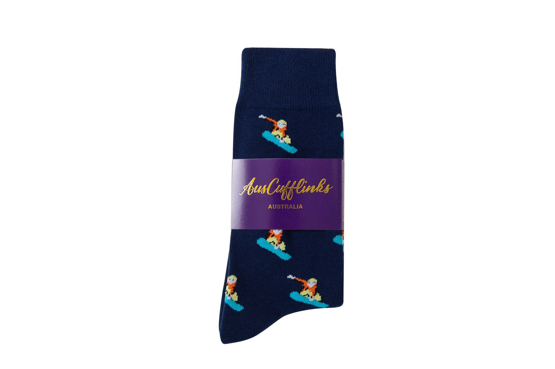 The Snowboarder Socks, a single navy blue sock with a vibrant, repeated snowboarder pattern and a purple label that reads "AustCufflinks Australia," perfectly capture cool alpine style.