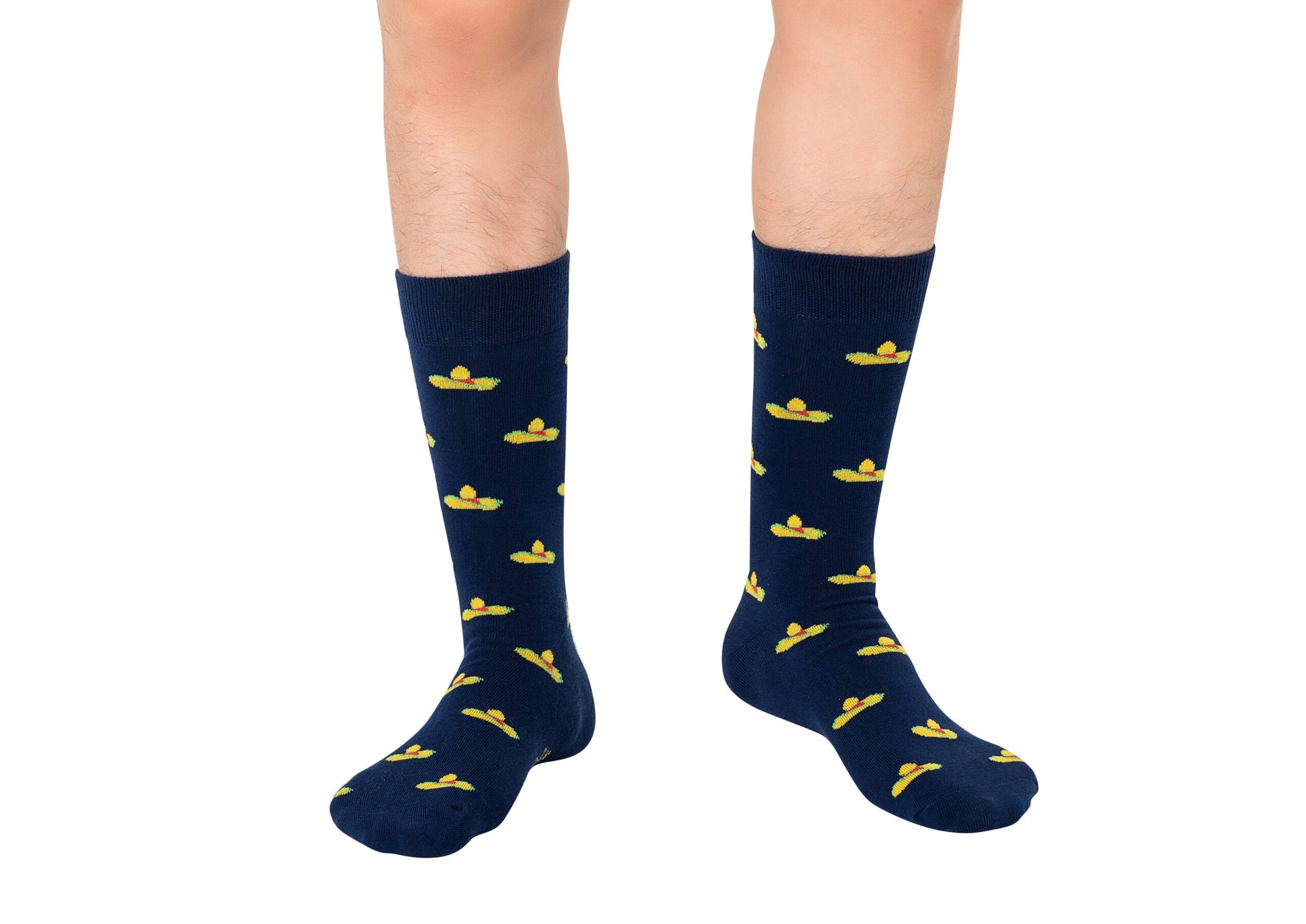 A fiesta for the feet, these Sombrero Socks feature a cheerful yellow duck pattern on a navy blue background.