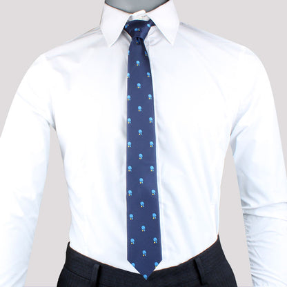 Mannequin exuding refined charm in a white dress shirt, a Sports Theme Tie, and black trousers against a plain background.