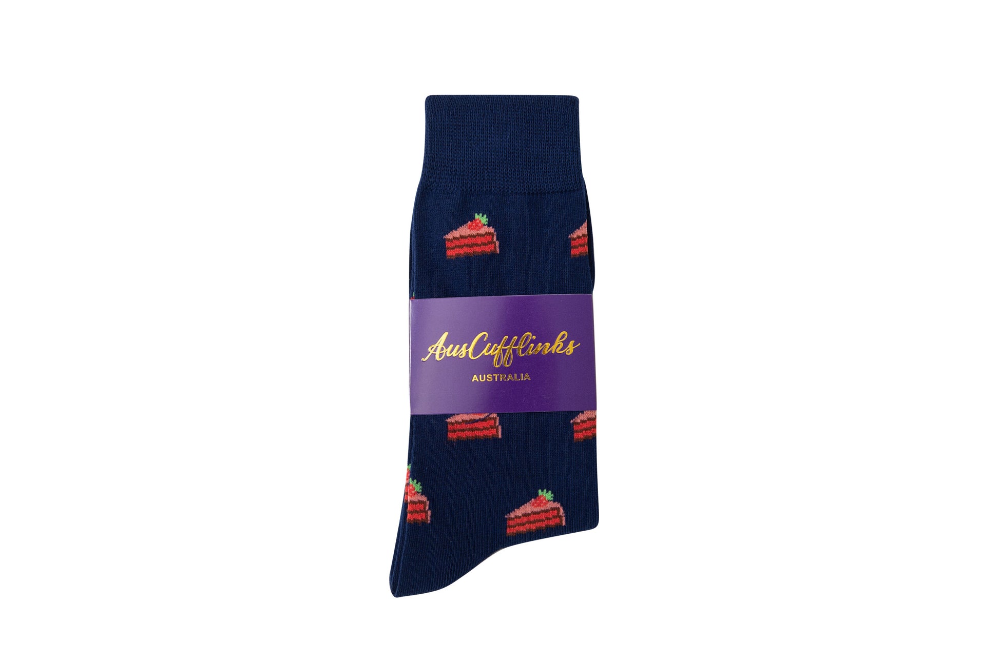 Image of a pair of blue socks featuring a sweet repeating pattern of birthday cake slices in a layered style. The socks are presented with purple band packaging that has the text "Strawberry Cake Socks".