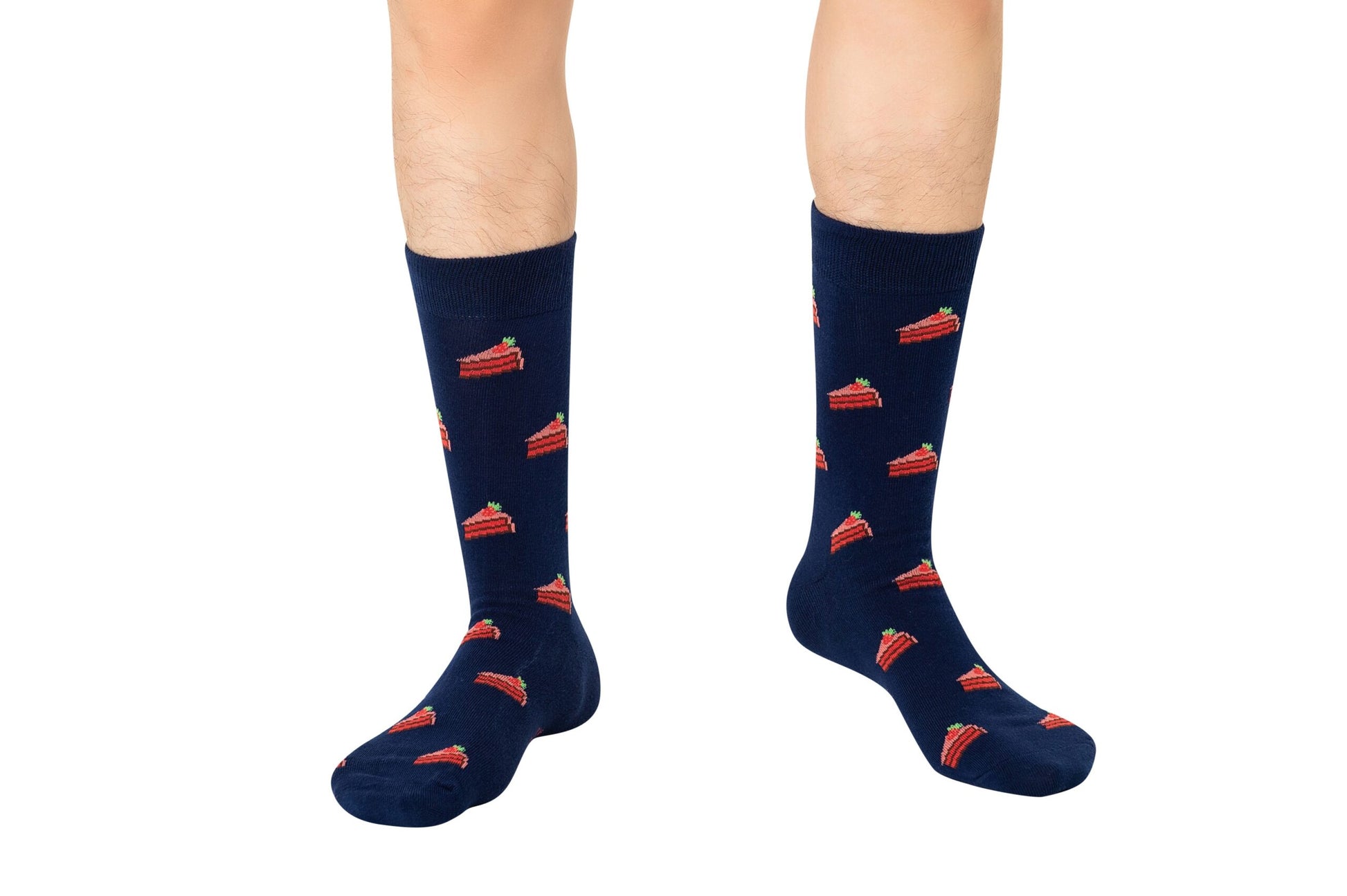 Person wearing navy blue Strawberry Cake Socks, adding a touch of layered style to their look.