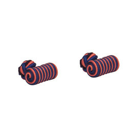 Two coiled hair ties with alternating purple and pink stripes create a stunning harmony of hues against a plain white background.