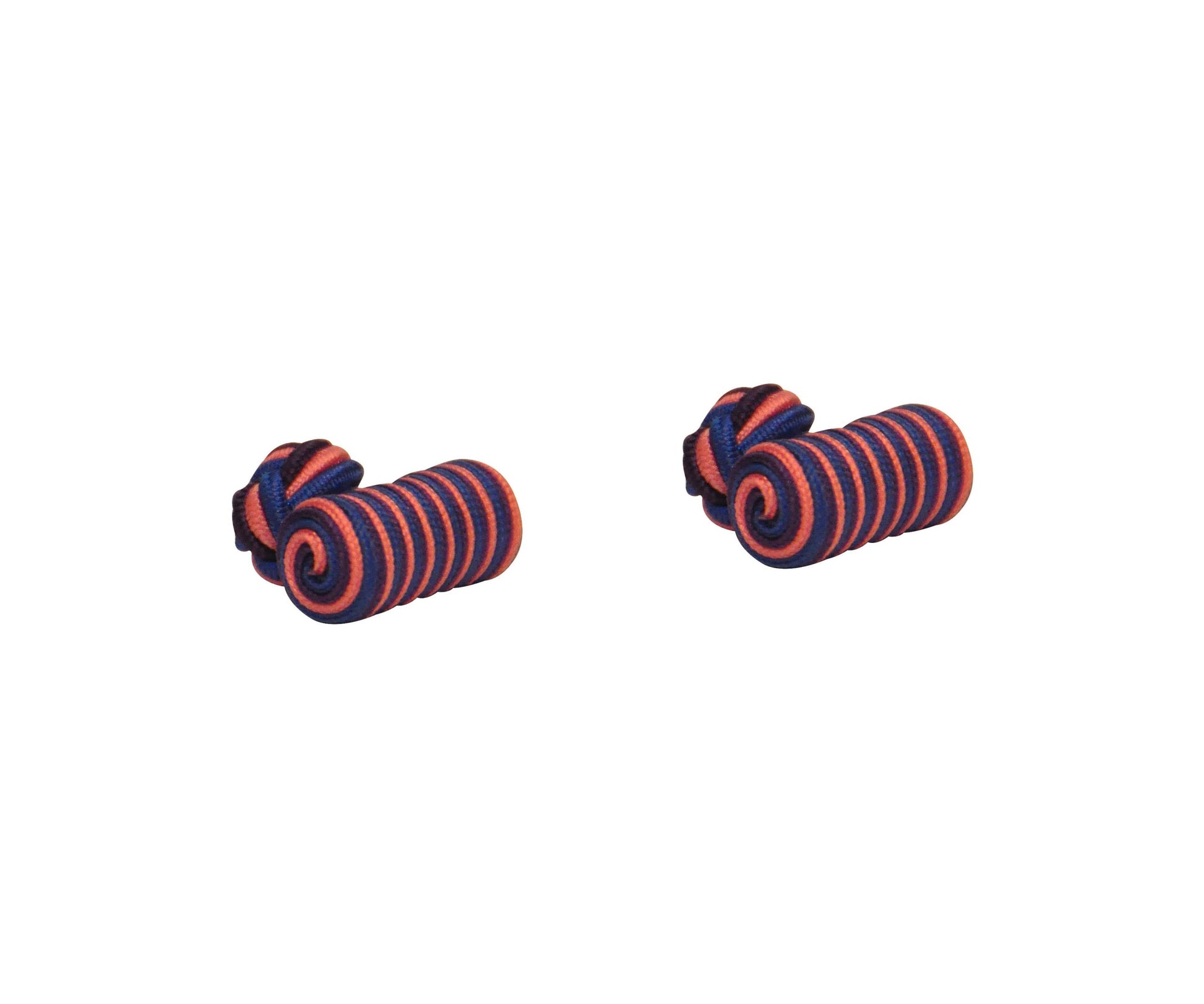Two coiled hair ties with alternating purple and pink stripes create a stunning harmony of hues against a plain white background.