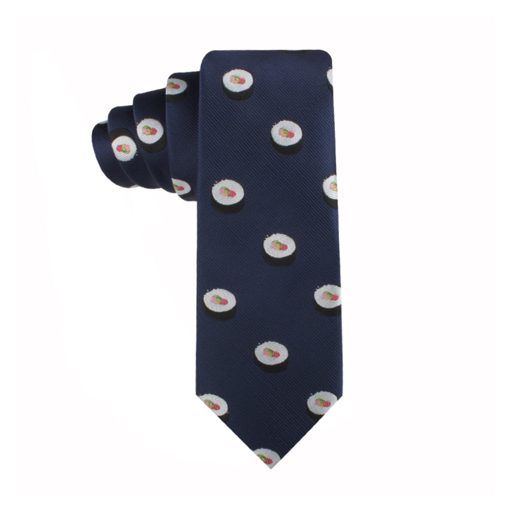 The Sushi Thin Tie is a dark blue necktie adorned with a repeating pattern of small sushi rolls showcasing white rice with red and green filling, exuding modern charm and culinary artistry.