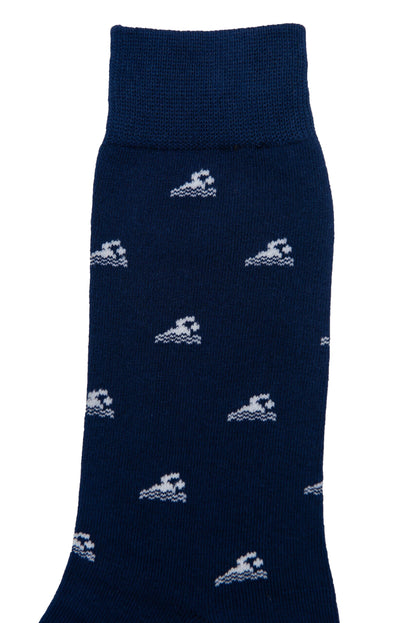 Swimming Socks in navy blue, featuring a wave-washed style with a pattern of small, white wave designs.