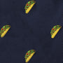 Embroidered pattern of yellow tacos with red and green fillings on a dark blue fabric background, showcasing a spicy style Taco Bow Tie.