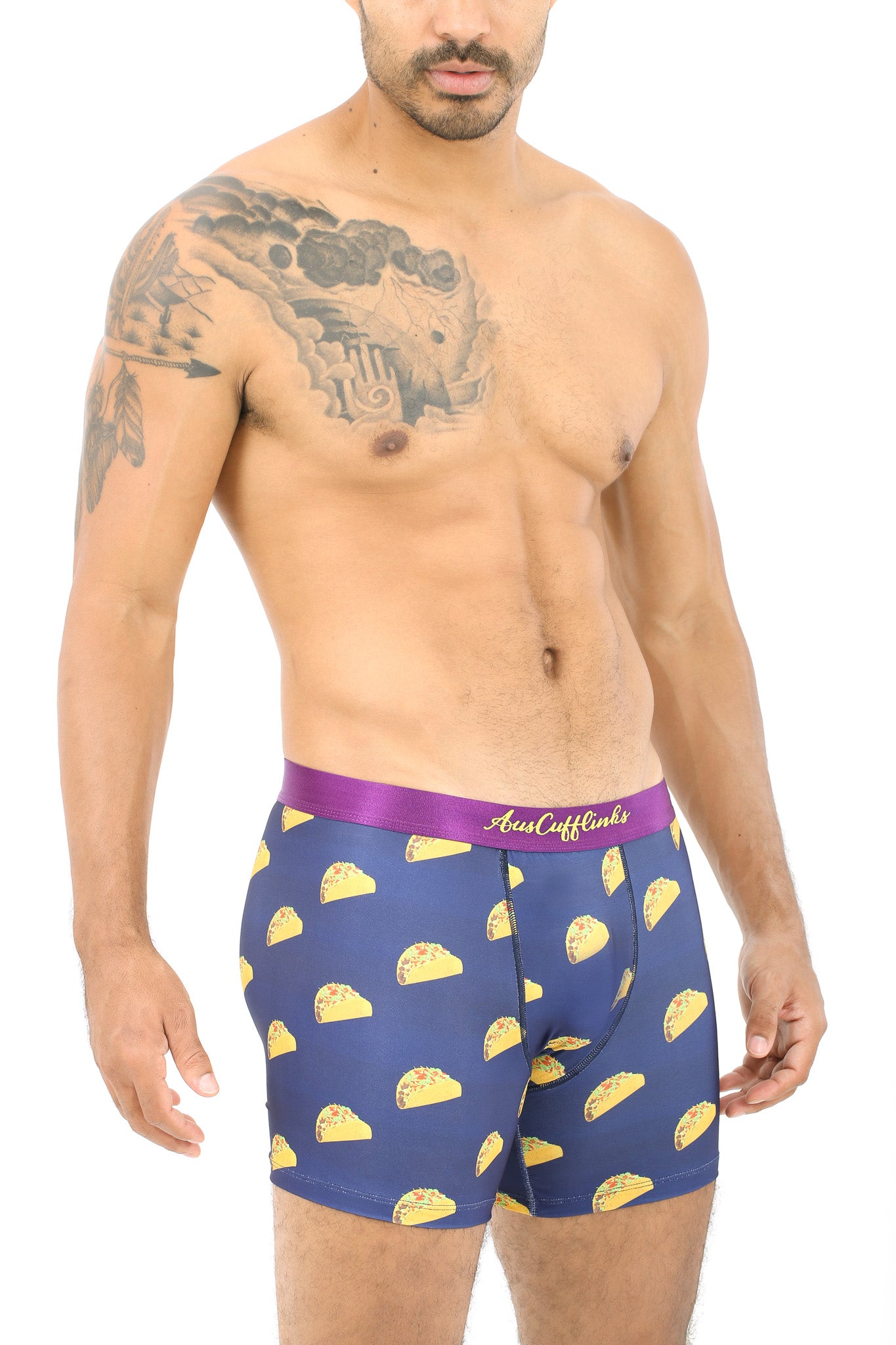 A shirtless man wears the Taco Underwear, featuring navy blue boxer briefs with a taco pattern. They're perfect for taco lovers seeking moisture-wicking comfort and style in one fun package.