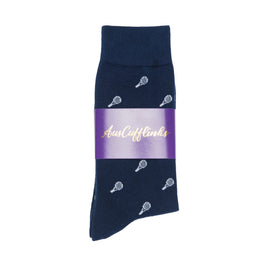 A pair of navy blue Tennis Socks with an embroidered tennis racket pattern, wrapped with a purple band labeled "AusCufflinks," designed for both performance and comfort.