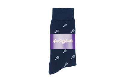 A pair of navy blue Tennis Socks with an embroidered tennis racket pattern, wrapped with a purple band labeled "AusCufflinks," designed for both performance and comfort.