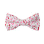The Tonal Pink Azalea Floral Cotton Bow Tie & Pocket Square Set features a white base with pink and red floral patterns, ideal for weddings, and is showcased against a plain white background.