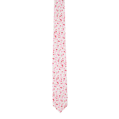 A narrow tie from the Tonal Pink Azalea Floral Cotton Skinny Tie & Pocket Square Set features a design in red and pink hues, evoking blooming azalea flowers against a crisp white background.