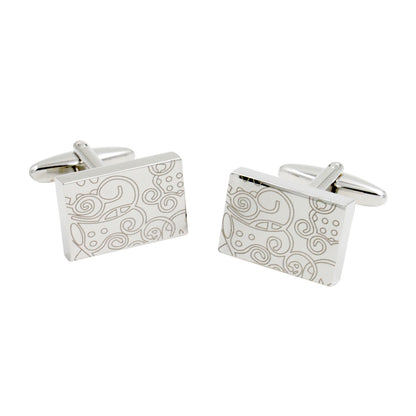 Paisley Cufflinks – Sleek & Modern Style for Men: Featuring engraved abstract swirl and dot designs on rectangular silver faces, these cufflinks offer classic sophistication and make an ideal gift for him.