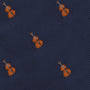 Dark blue fabric with a diagonal ribbed texture, featuring a repeated pattern of small, orange violin illustrations, exuding an air of sophistication: Violin Bow Tie.