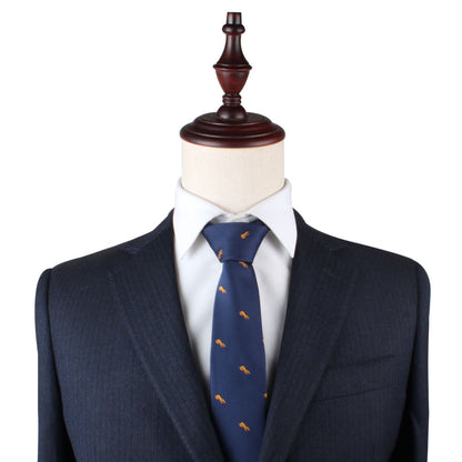 A mannequin dressed in a dark suit, white shirt, and an Orange Fox Skinny Tie stands against a plain white background, subtly hinting at the wild allure of style.