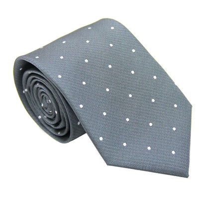 The Grey White Polka Dot Business Tie & Pocket Square Set, featuring a monochrome gray necktie adorned with small white polka dots, is elegantly rolled up and displayed against a plain white background.