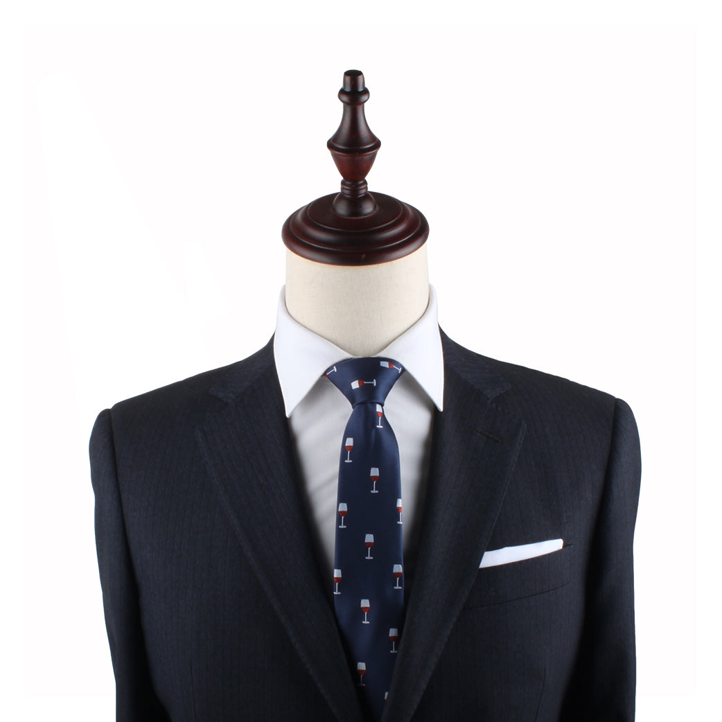 Mannequin dressed in a dark suit with a white dress shirt and the Wine Slim Tie, exuding modern charm against a plain white background.