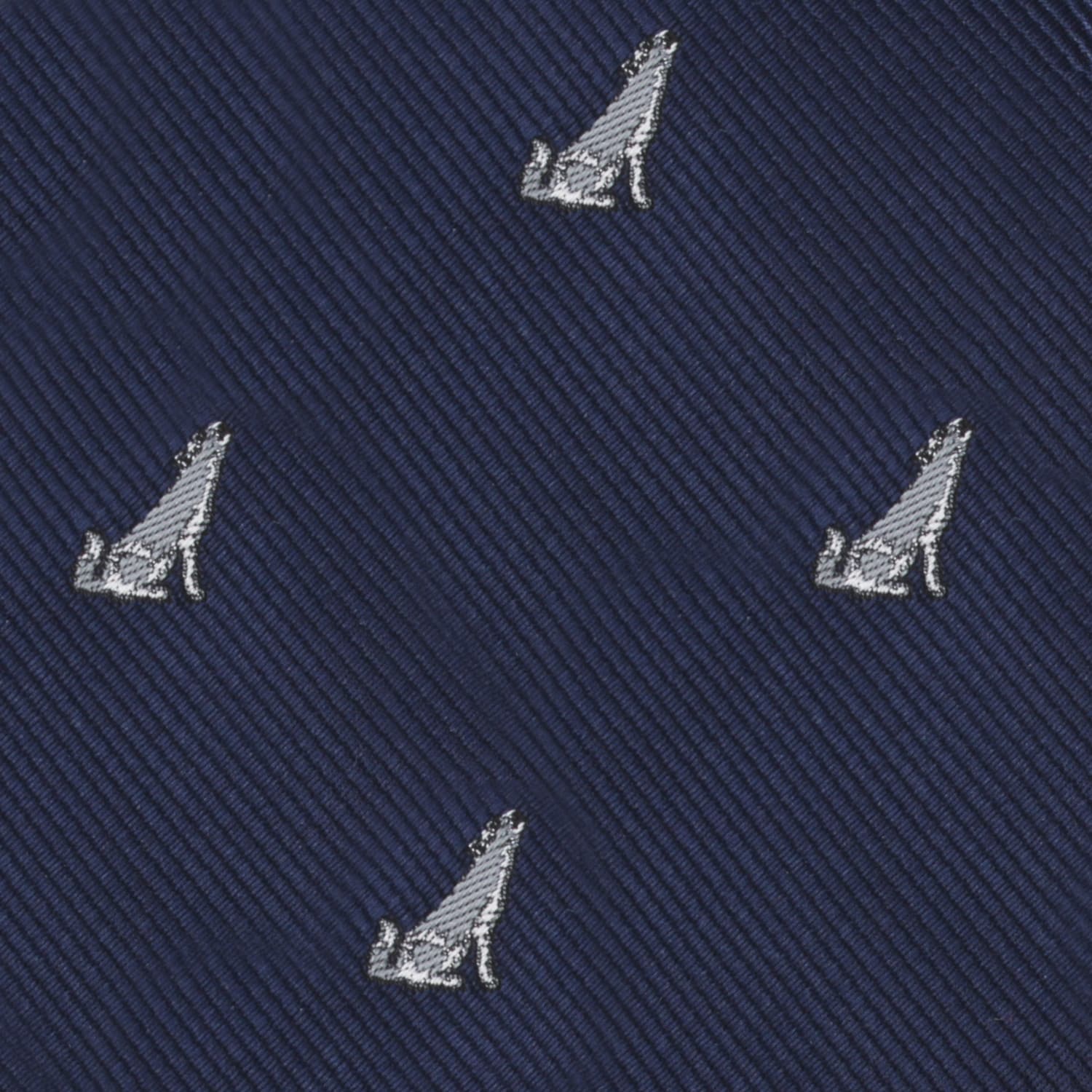 Uncover the Wolf Bow Tie, featuring dark blue fabric with diagonal lines and a repeated pattern of small light gray embroidered howling wolves, adding elegance to any formal look.