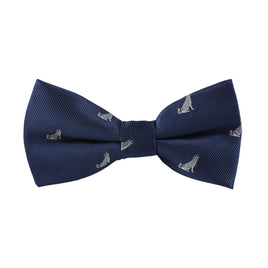 The Wolf Bow Tie, featuring a navy blue design with embroidered silver wolves, is a striking statement piece.